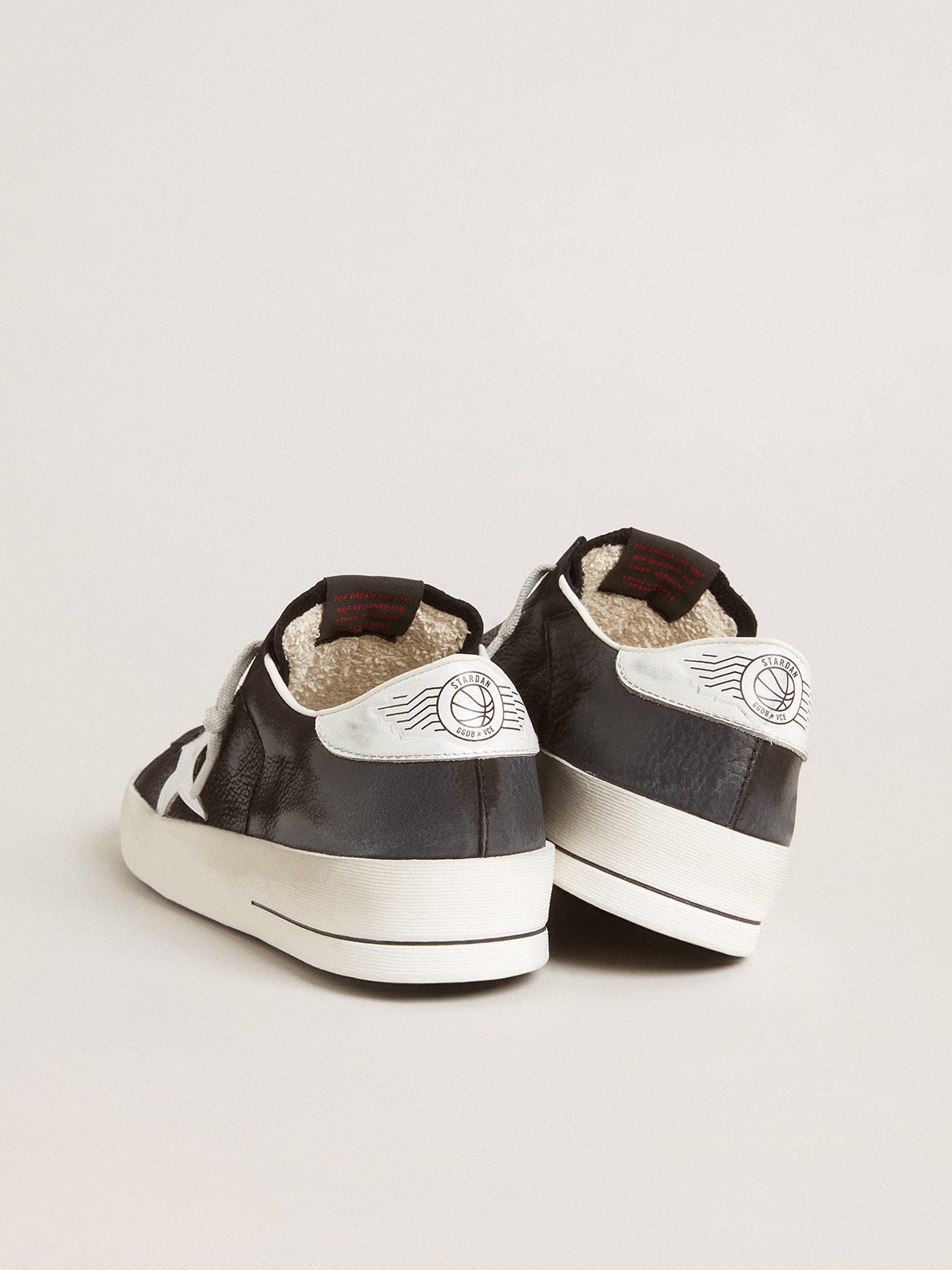 Stardan in black nubuck and mesh with gray leather star and heel tab