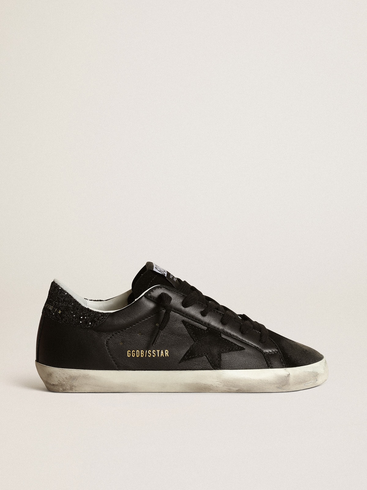 Women's Super-Star in black nappa with black star and glitter heel tab