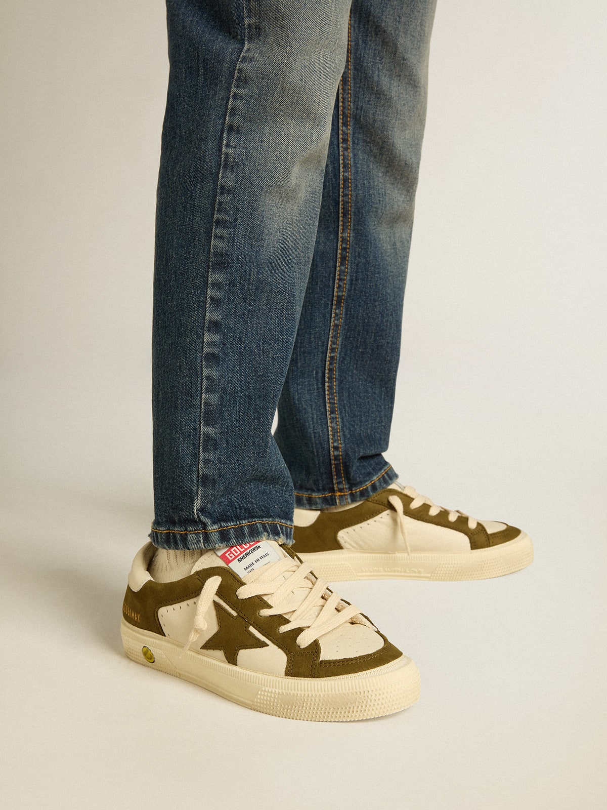 May Junior in white and military green leather