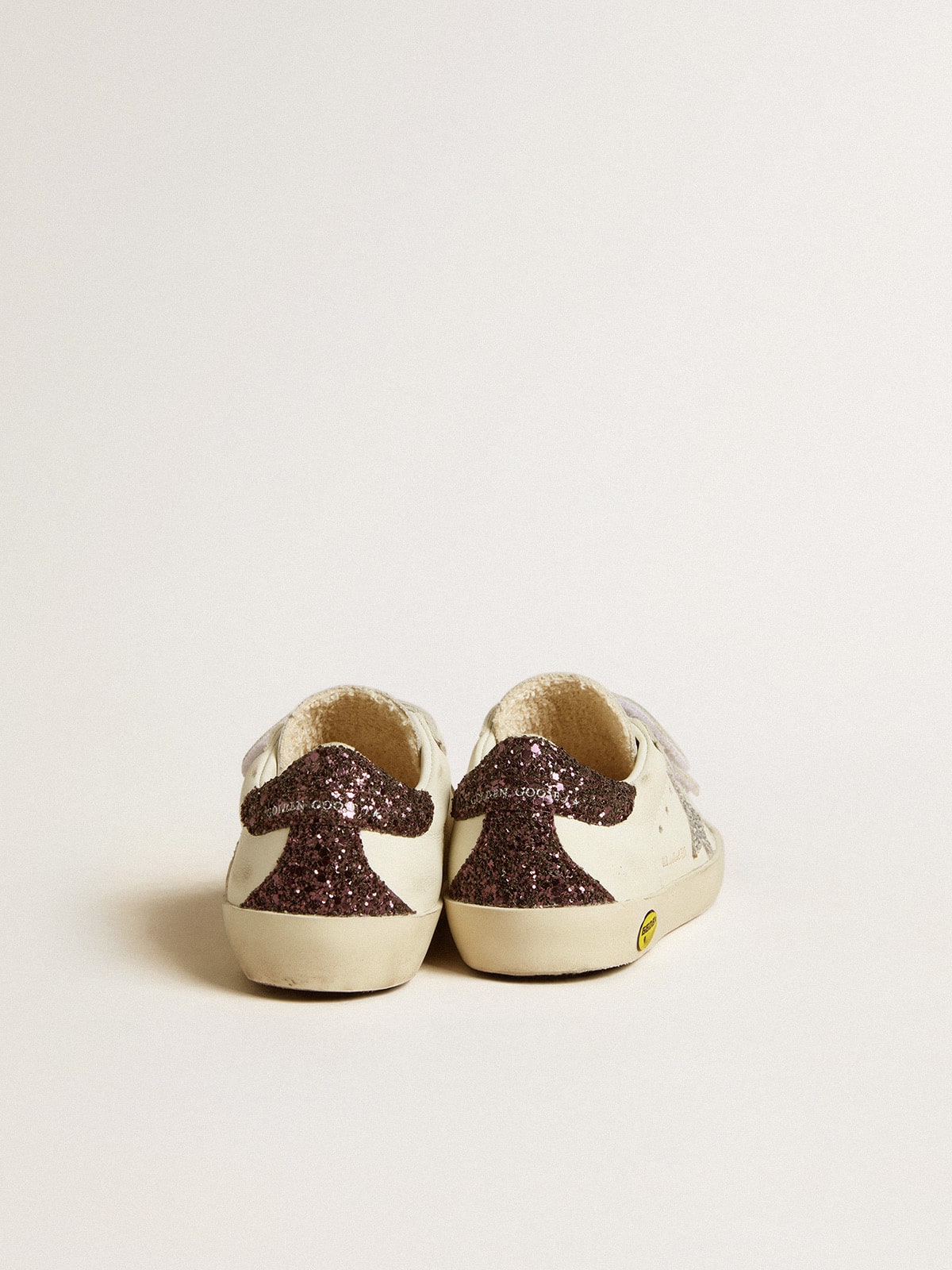 Old School Young with silver glitter star and glitter heel tab
