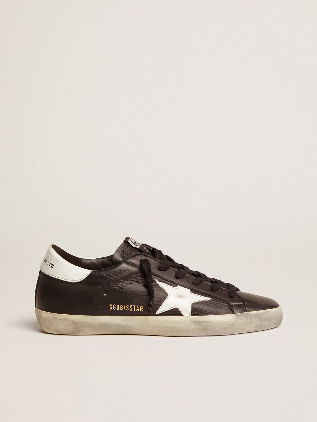 Women's Super-Star in black leather with white leather star and heel tab