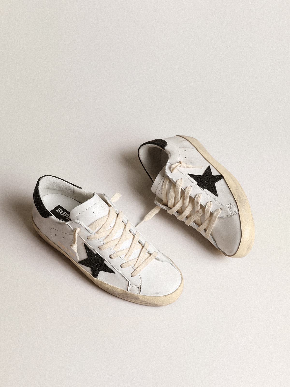 Women's Super-Star with a black Swarovski crystal star and heel tab