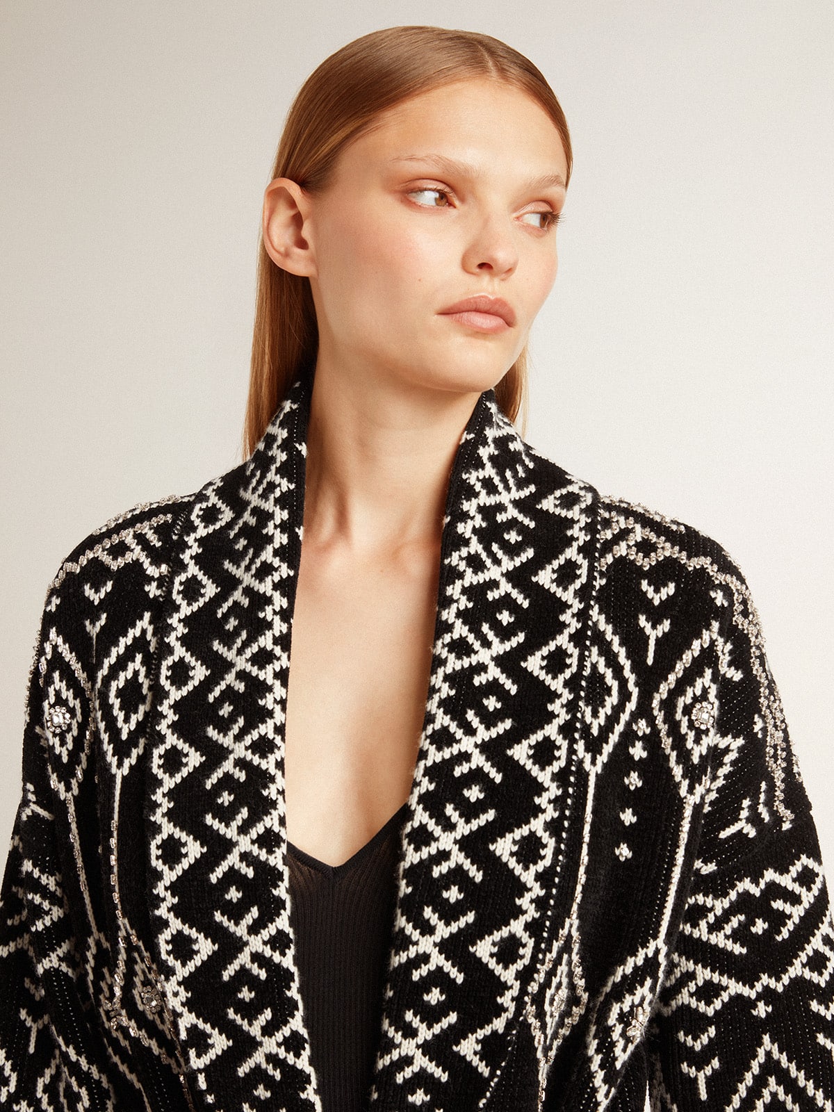 Women's black cardigan with belt and crystals
