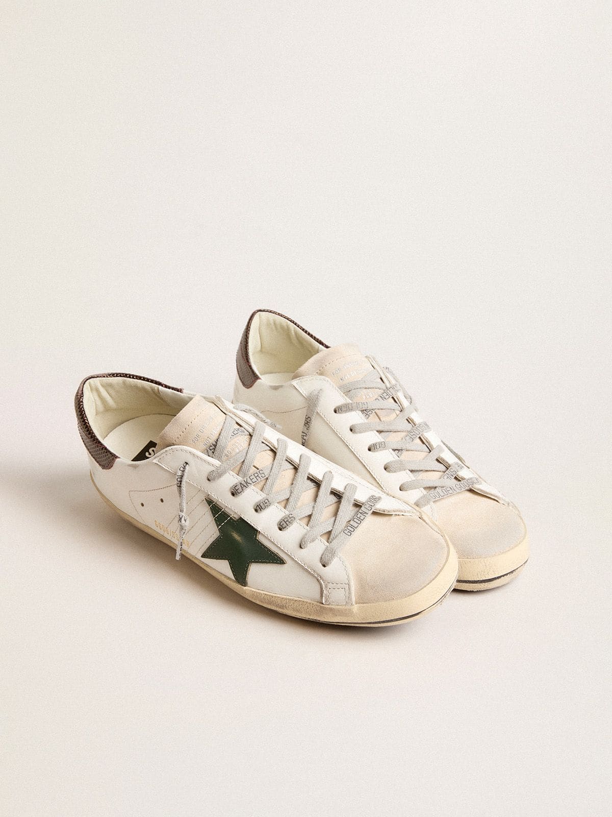 Men's Super-Star in white leather with green star and animal-print heel tab