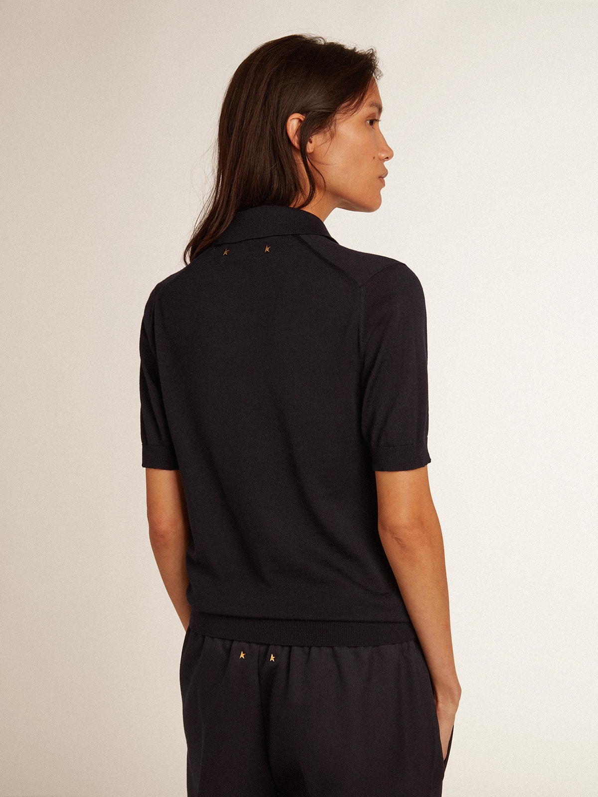 Women's polo shirt in navy-blue merino wool