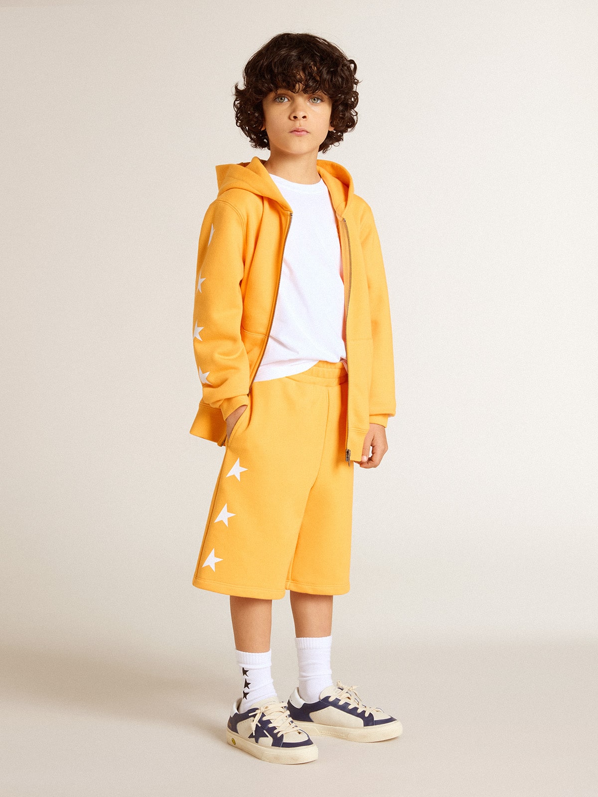 Boys' orange sweatshirt with zip fastening