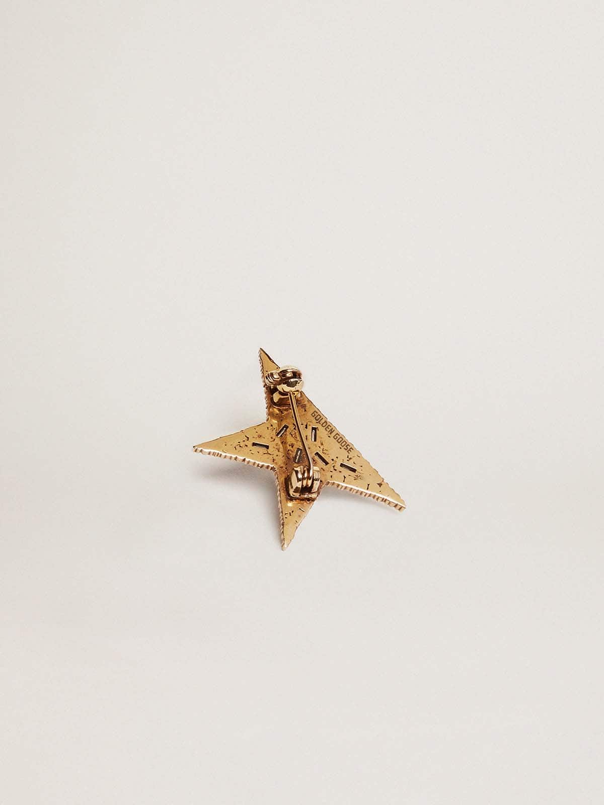 Women's antique gold-colored brooch with decorative crystals