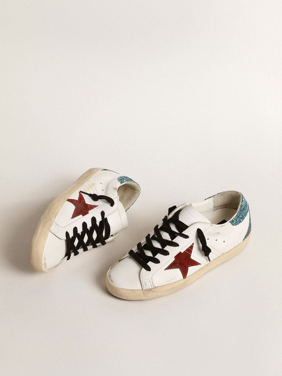 Women's Super-Star with burgundy suede star and light blue glitter heel tab