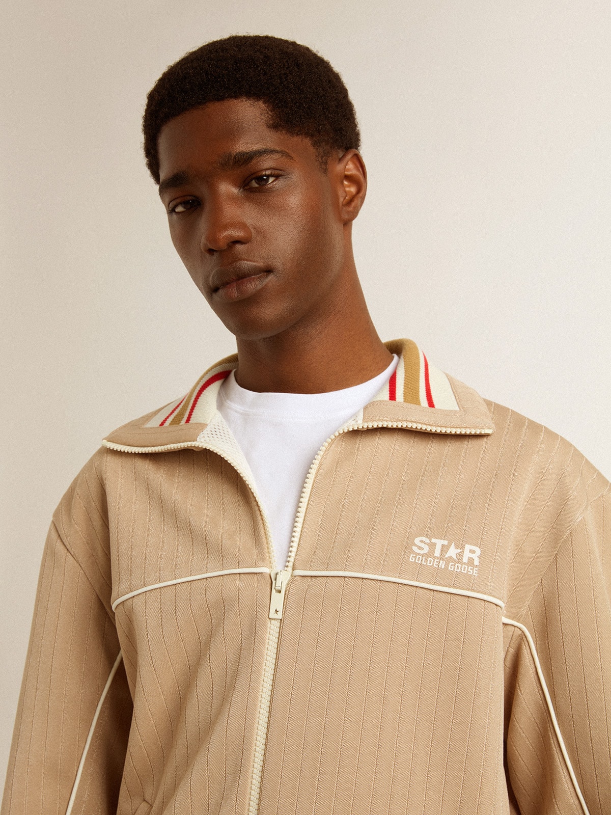 Men's light beige zipped sweatshirt with white logo