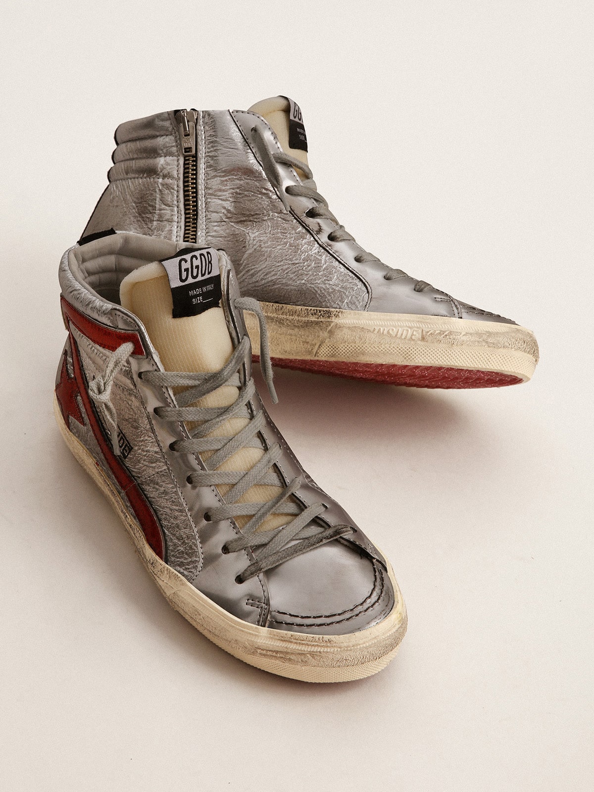 Women's Slide with silver metallic leather upper and red metallic leather flash