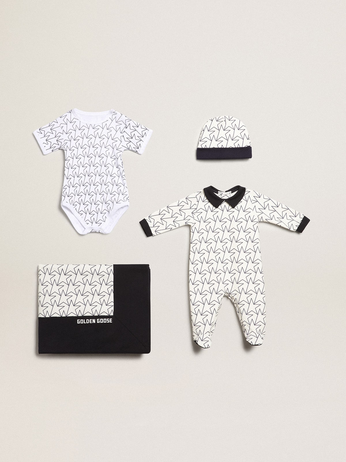 Baby gift set in white with navy blue trim and star