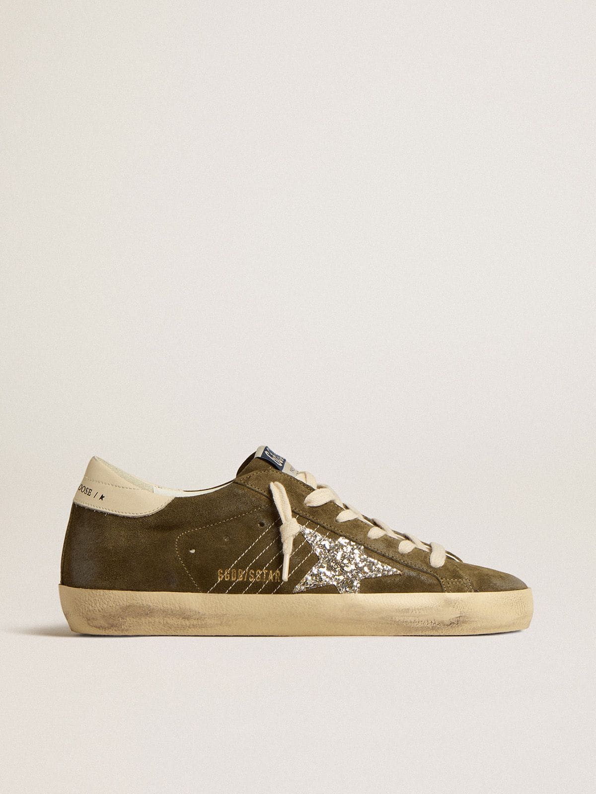 Women's Super-Star in green suede with glitter star and cream heel tab