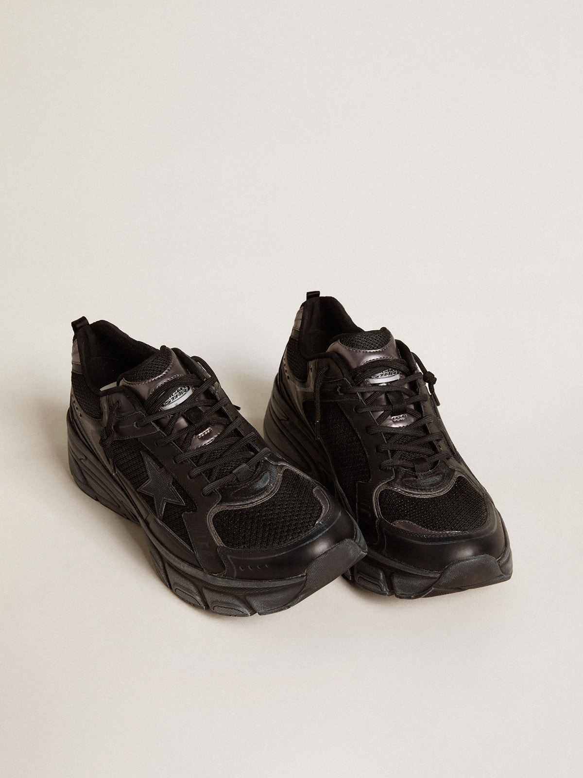 Women's Lightstar with black leather and mesh upper and black star