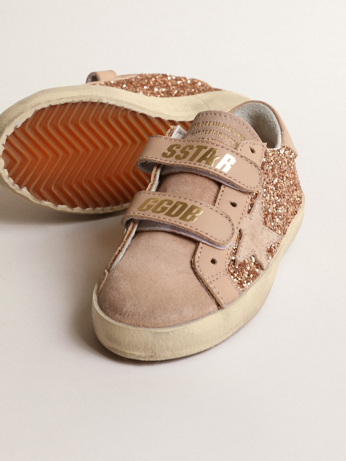Old School Junior in peach-pink glitter with pink suede star