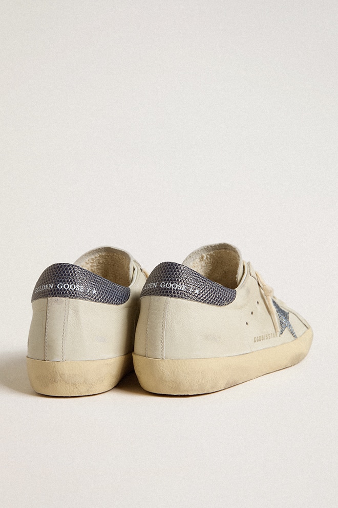 Super-Star LTD with cream-colored leather star with Swarovski crystals and blue leather heel tab with lizard print