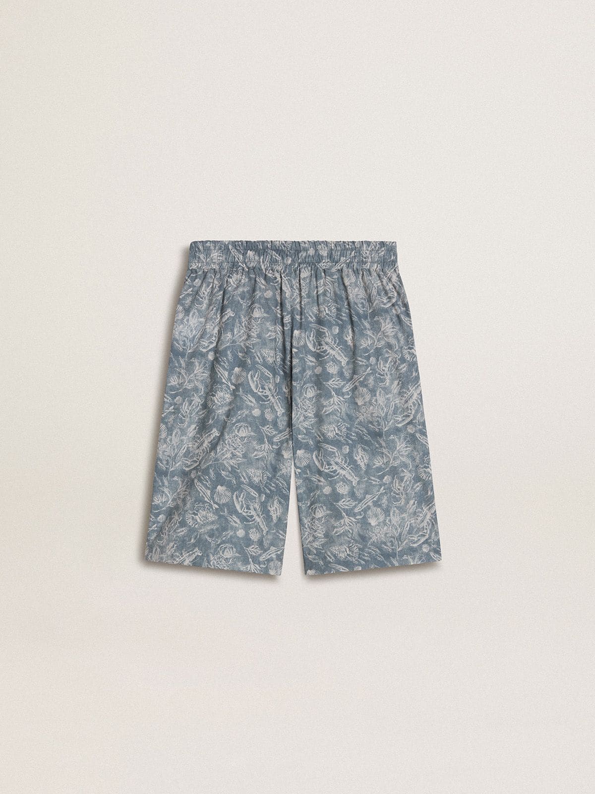 Boys' blue shorts with white print