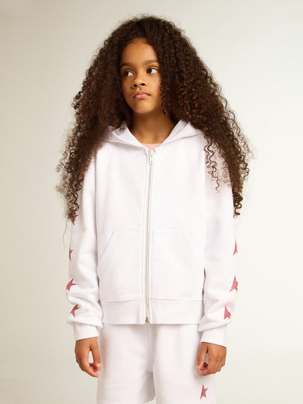 Girls' zip-up sweatshirt in white with glitter stars on the sleeves