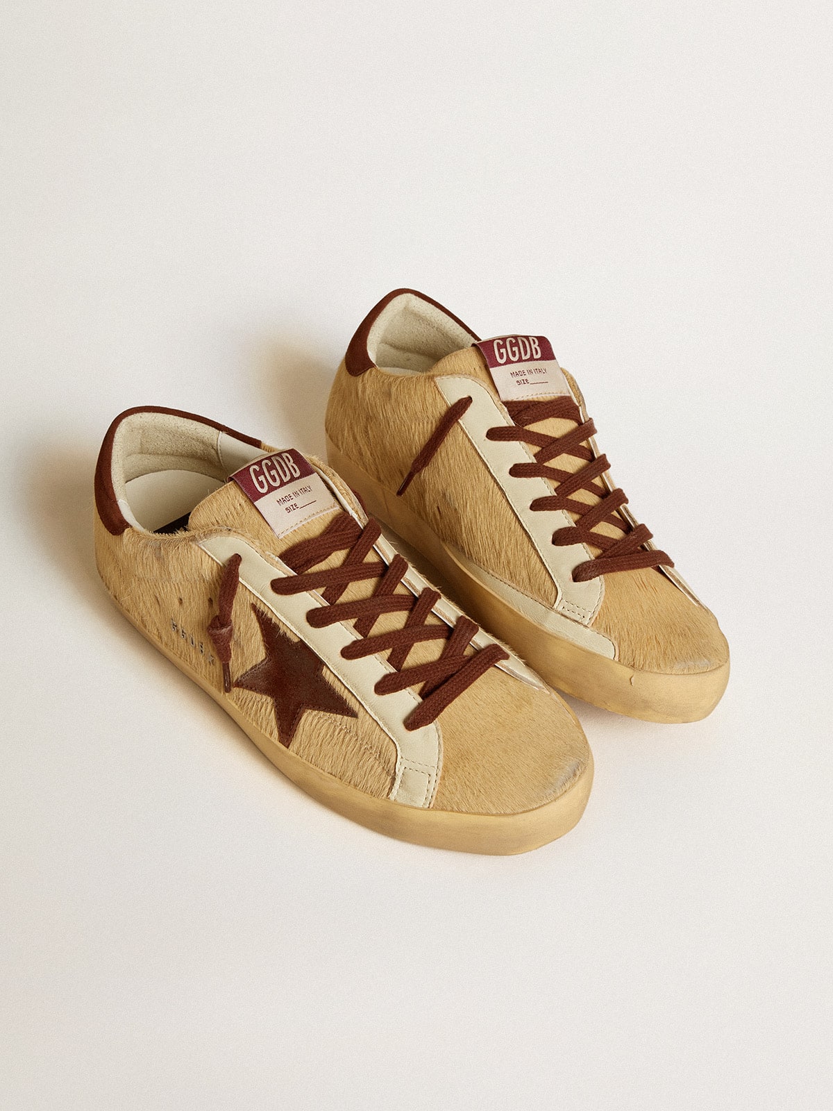 Women's Super-Star in beige pony skin with brown suede star and heel tab