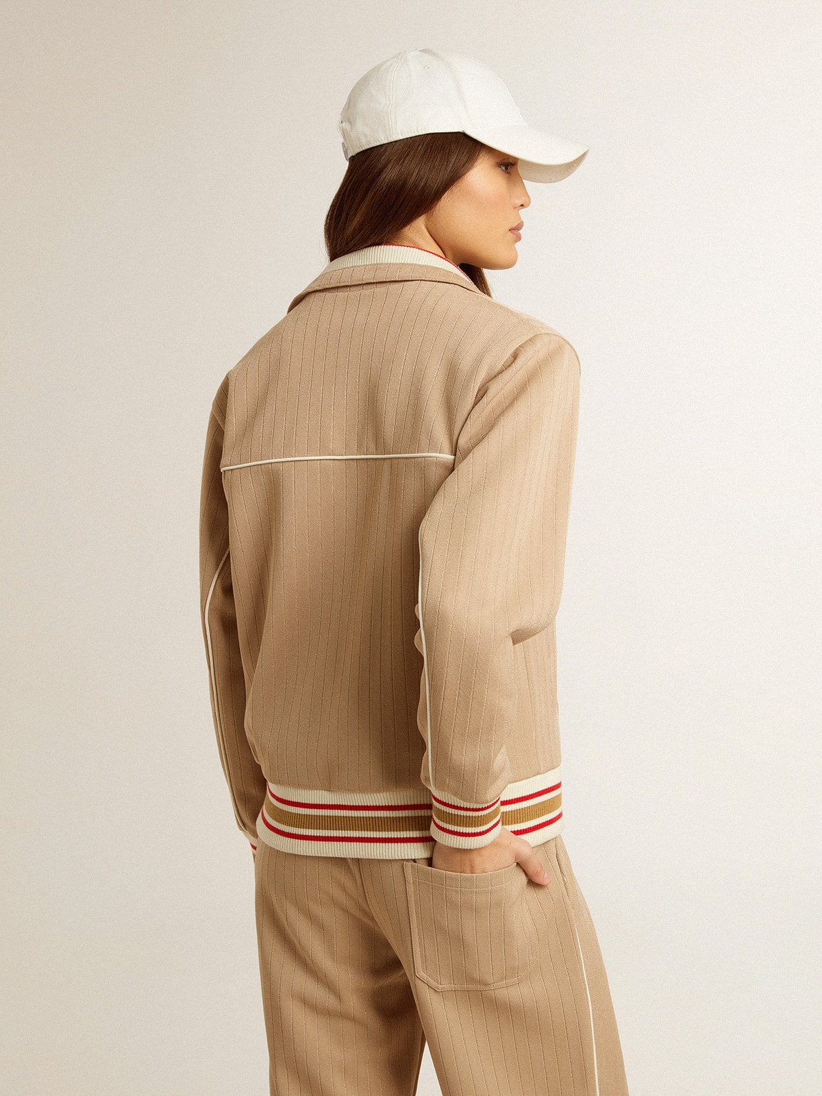 Women's light beige zipped sweatshirt with white logo
