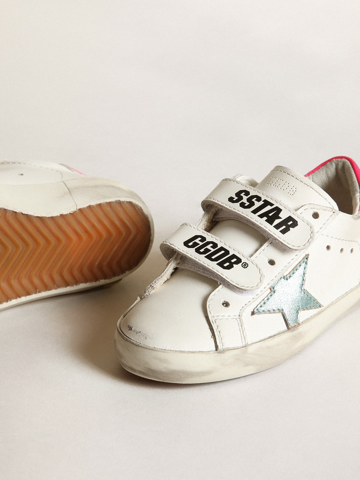 Young Old School with star in aquamarine laminated leather