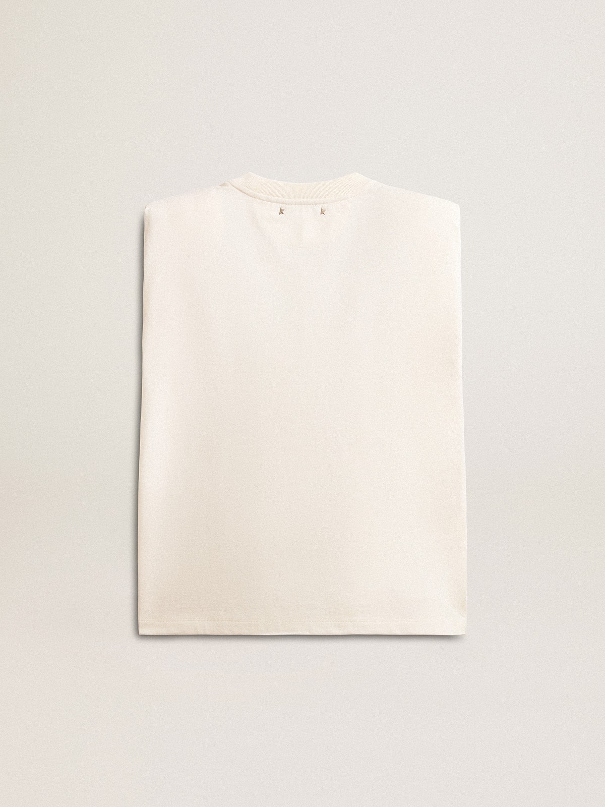 Aged white sleeveless T-shirt embellished with crystals