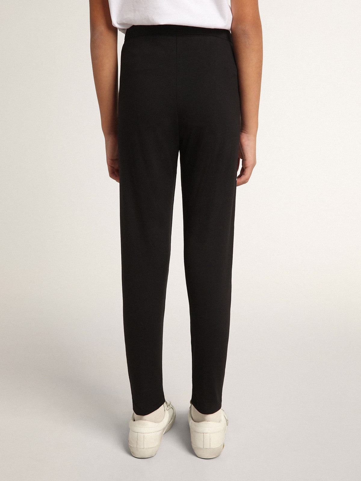 Girls' black leggings with white stars on the sides