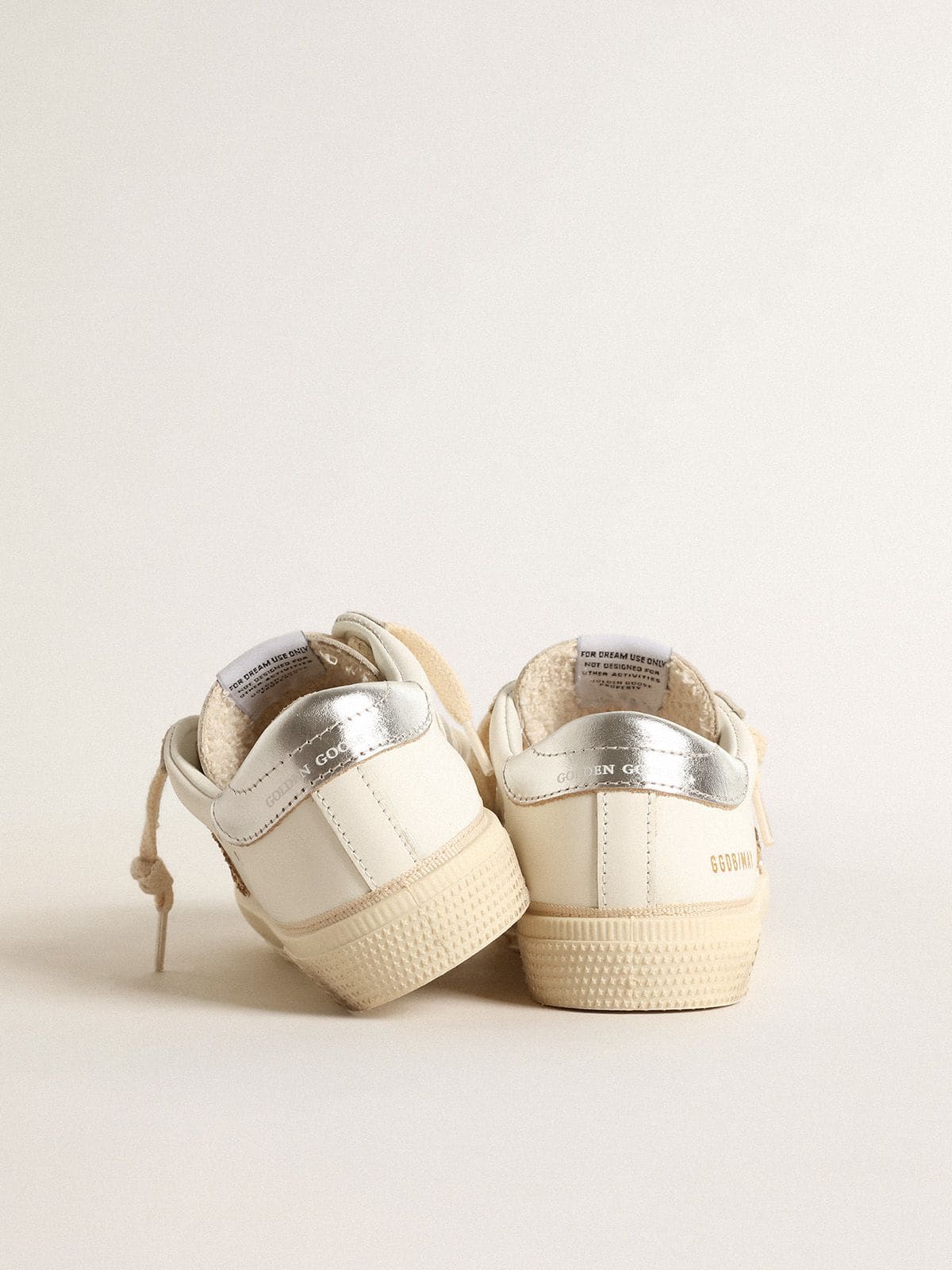 May Teen in white leather with gold glitter star and silver heel tab