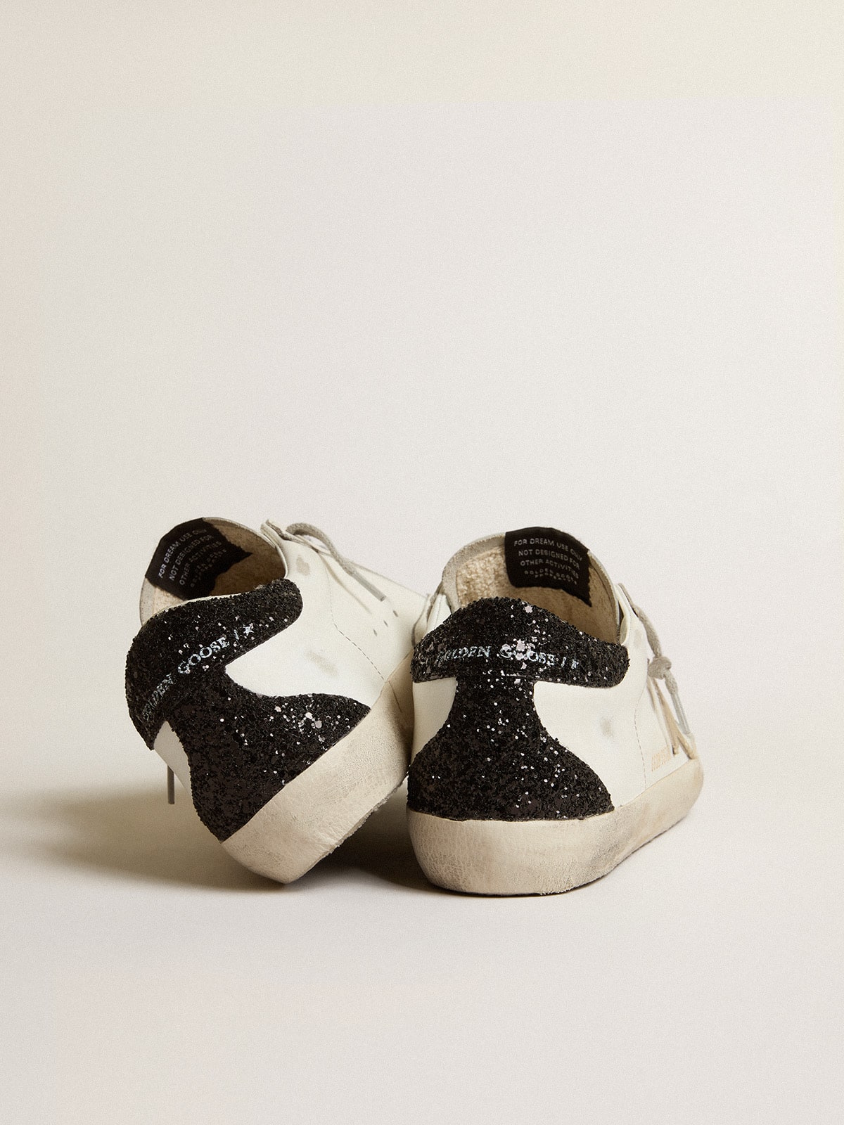 Women's Super-Star with gold star and black glitter heel tab