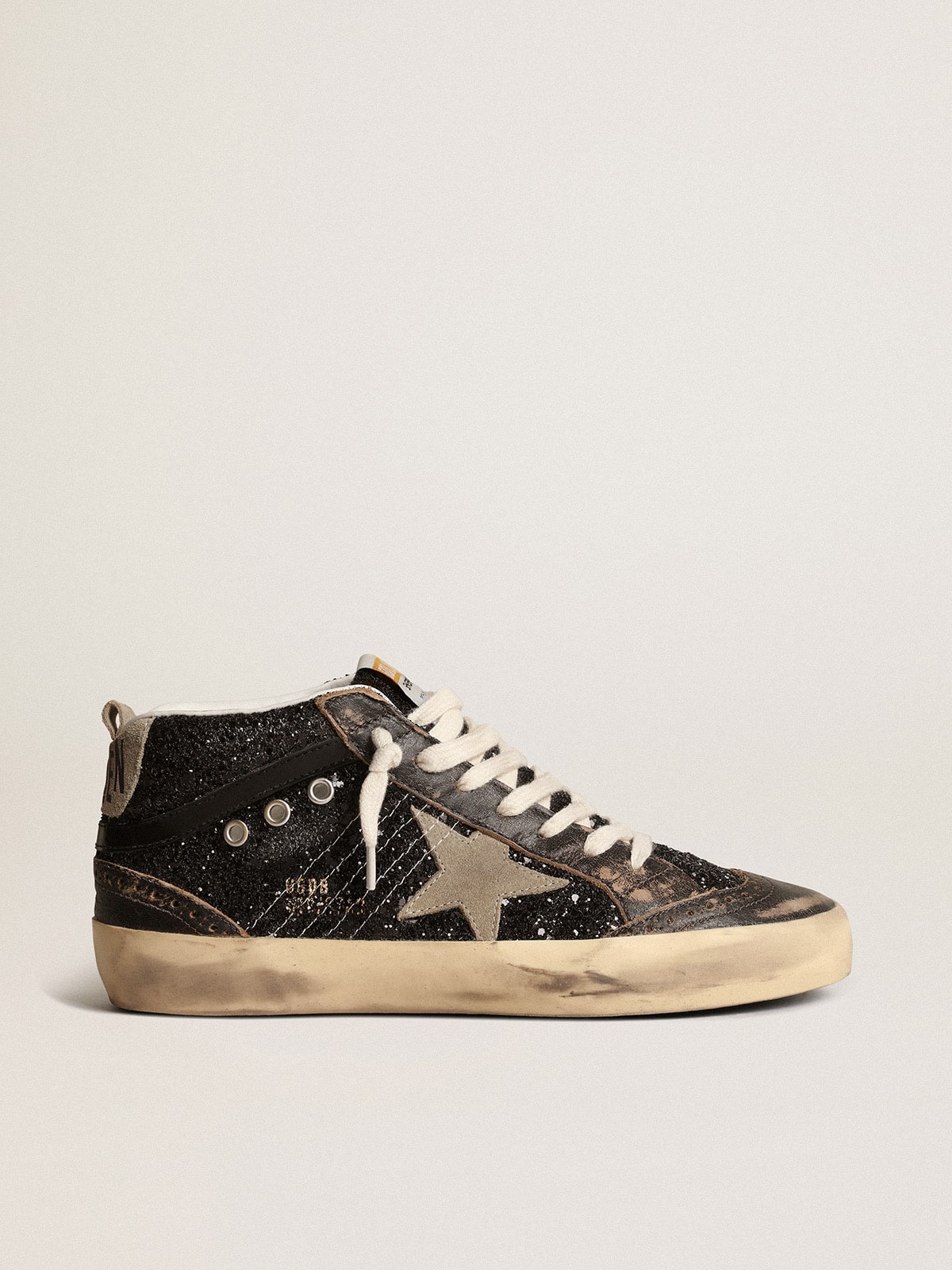 Women's Mid Star in black glitter with dove-gray suede star and heel tab