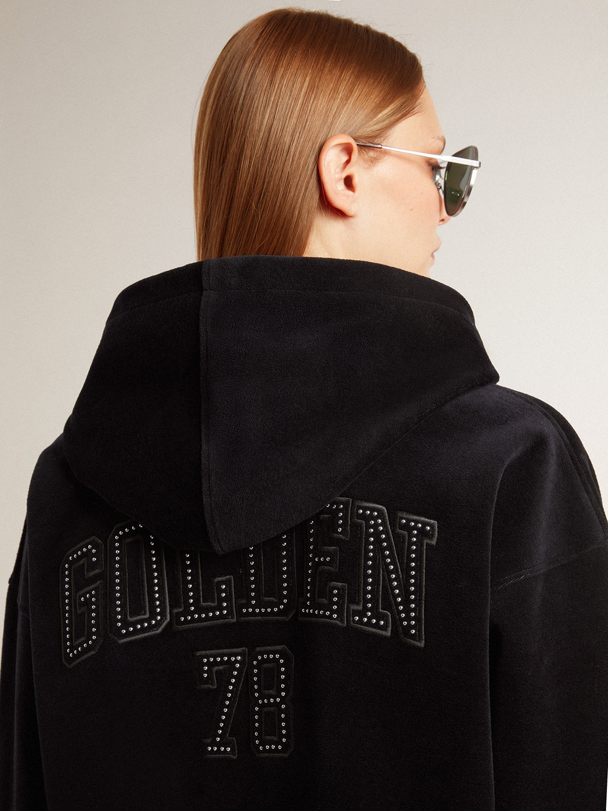 Women's black chenille sweatshirt with embroidery on the back