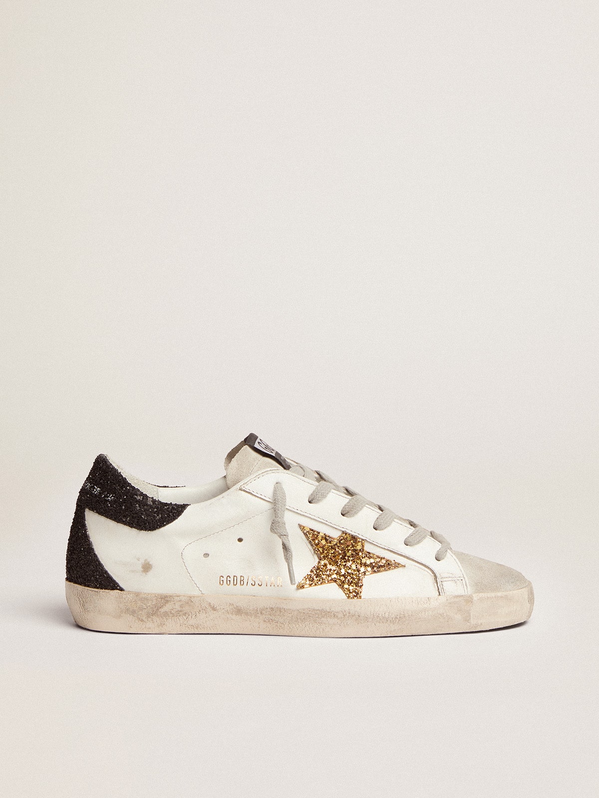 Women's Super-Star in nappa leather with gold glitter star and black glitter heel tab