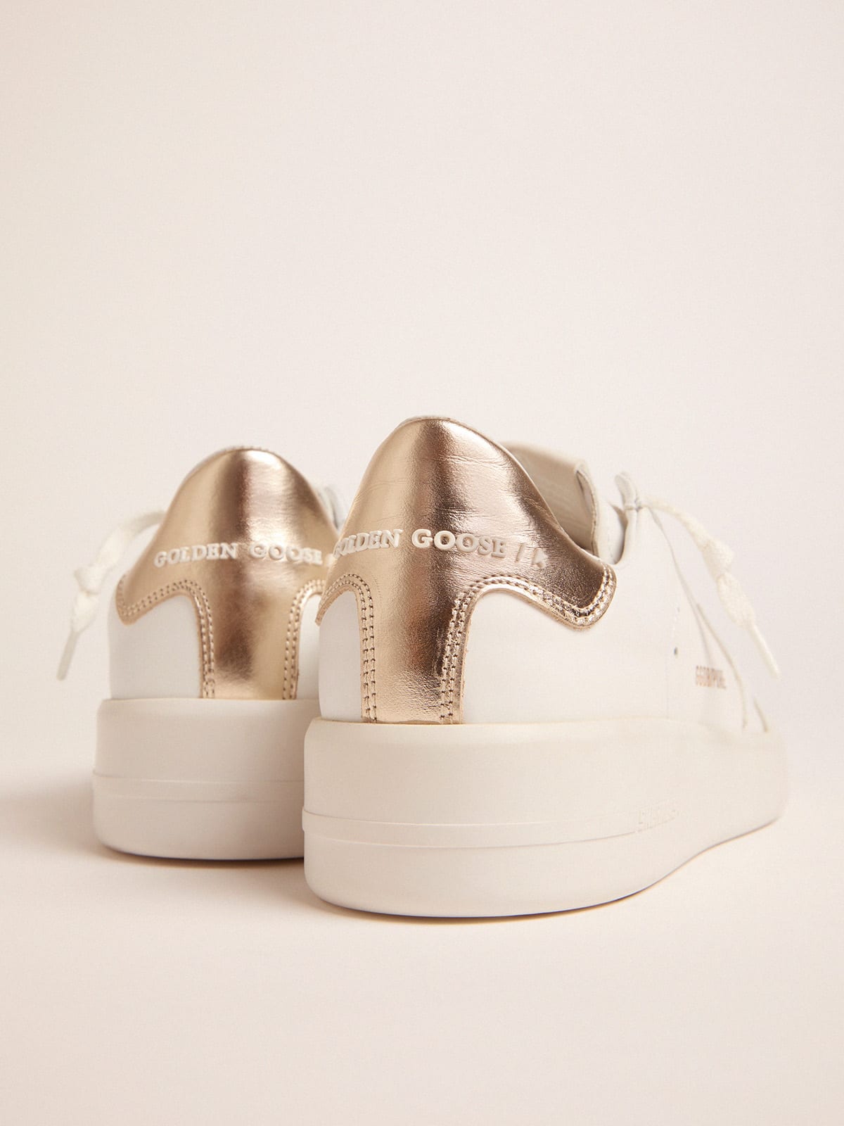 Women's Purestar sneakers with gold-coloured heel tab