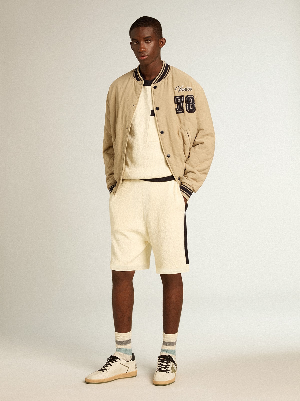 Khaki-colored quilted cotton bomber jacket