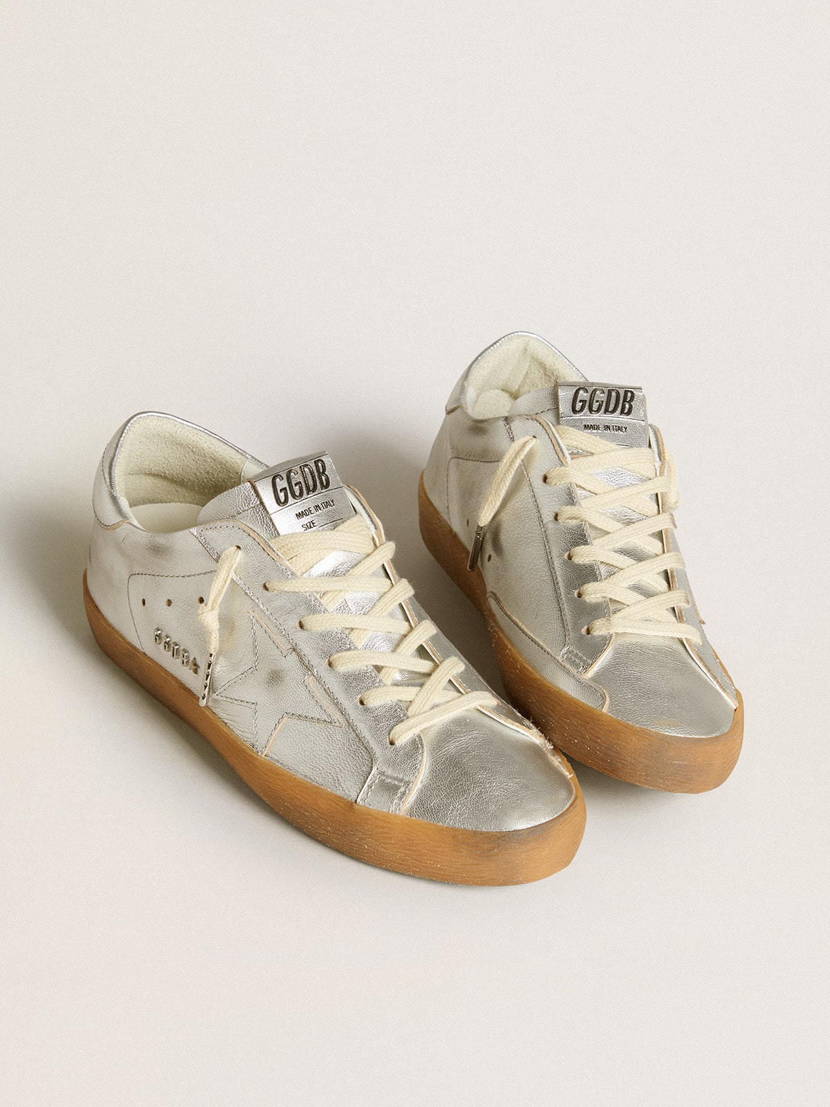 Super-Star in silver metallic leather with leather star and heel tab