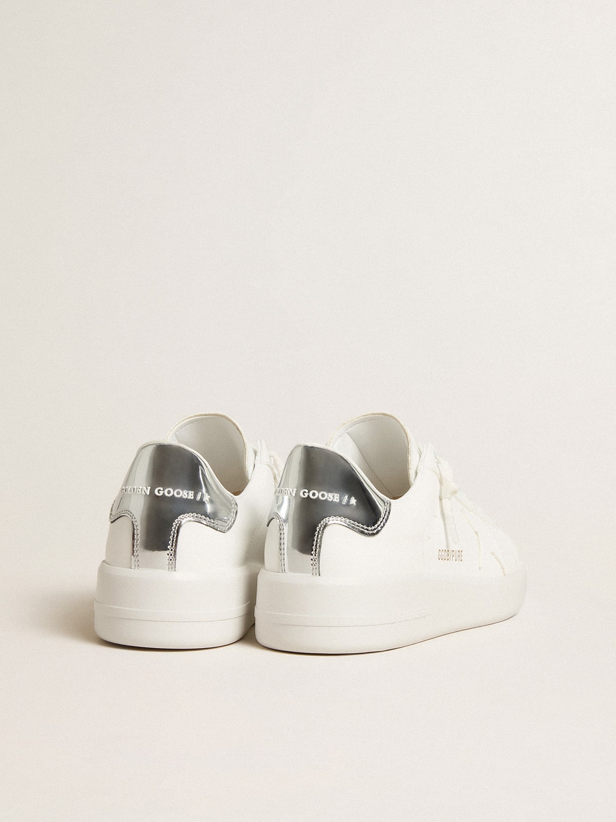 Women's bio-based Purestar with white star and mirror-effect heel tab