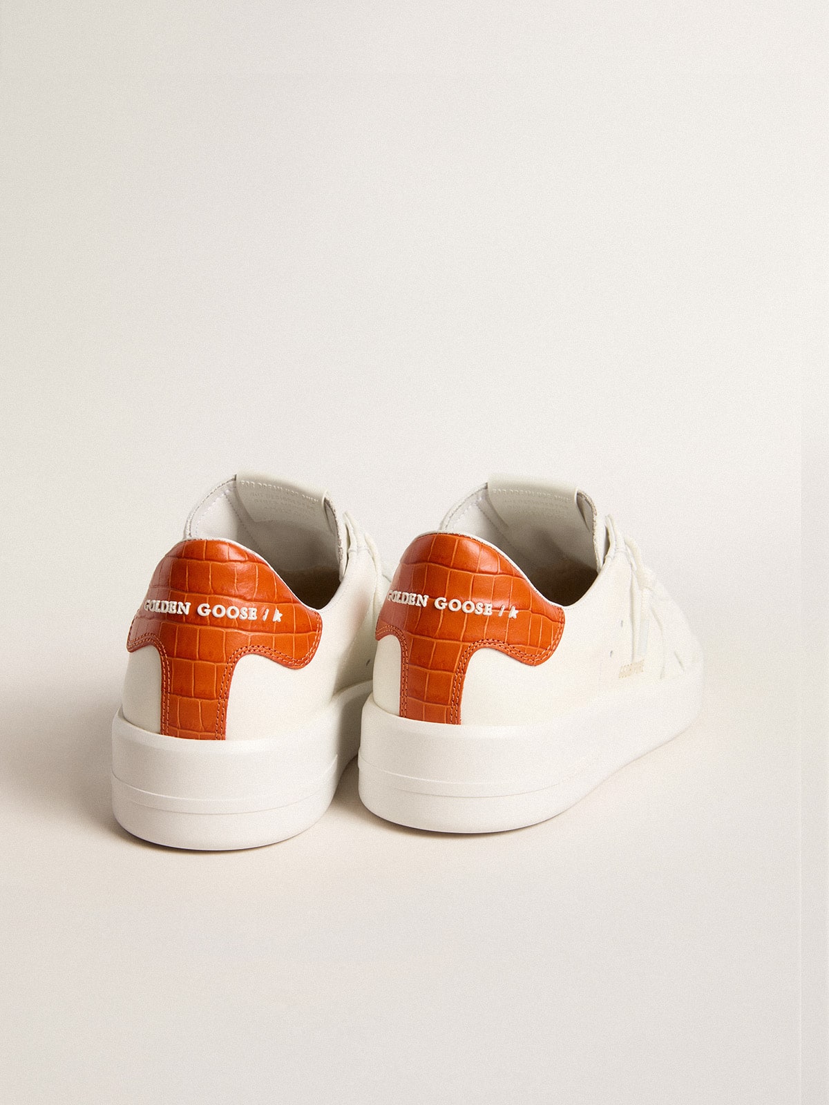 Women's Purestar with white leather star and orange heel tab