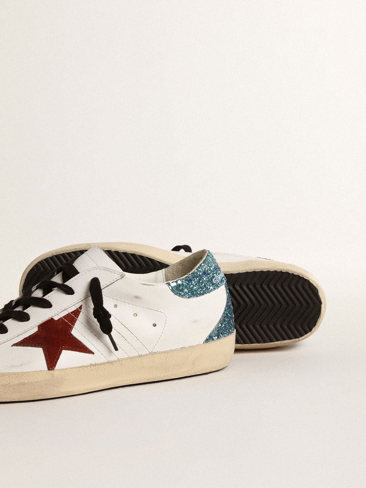 Women's Super-Star with burgundy suede star and light blue glitter heel tab