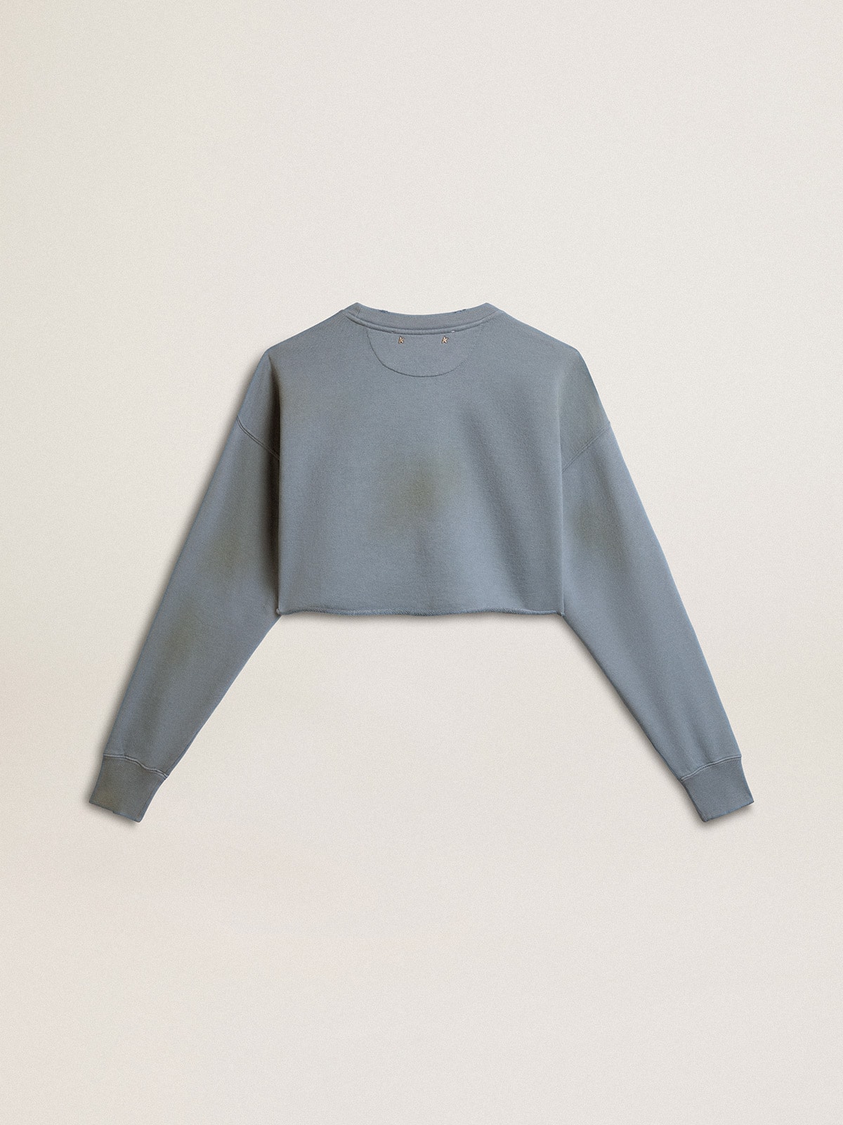 Cropped sweatshirt in baby blue with distressed finish