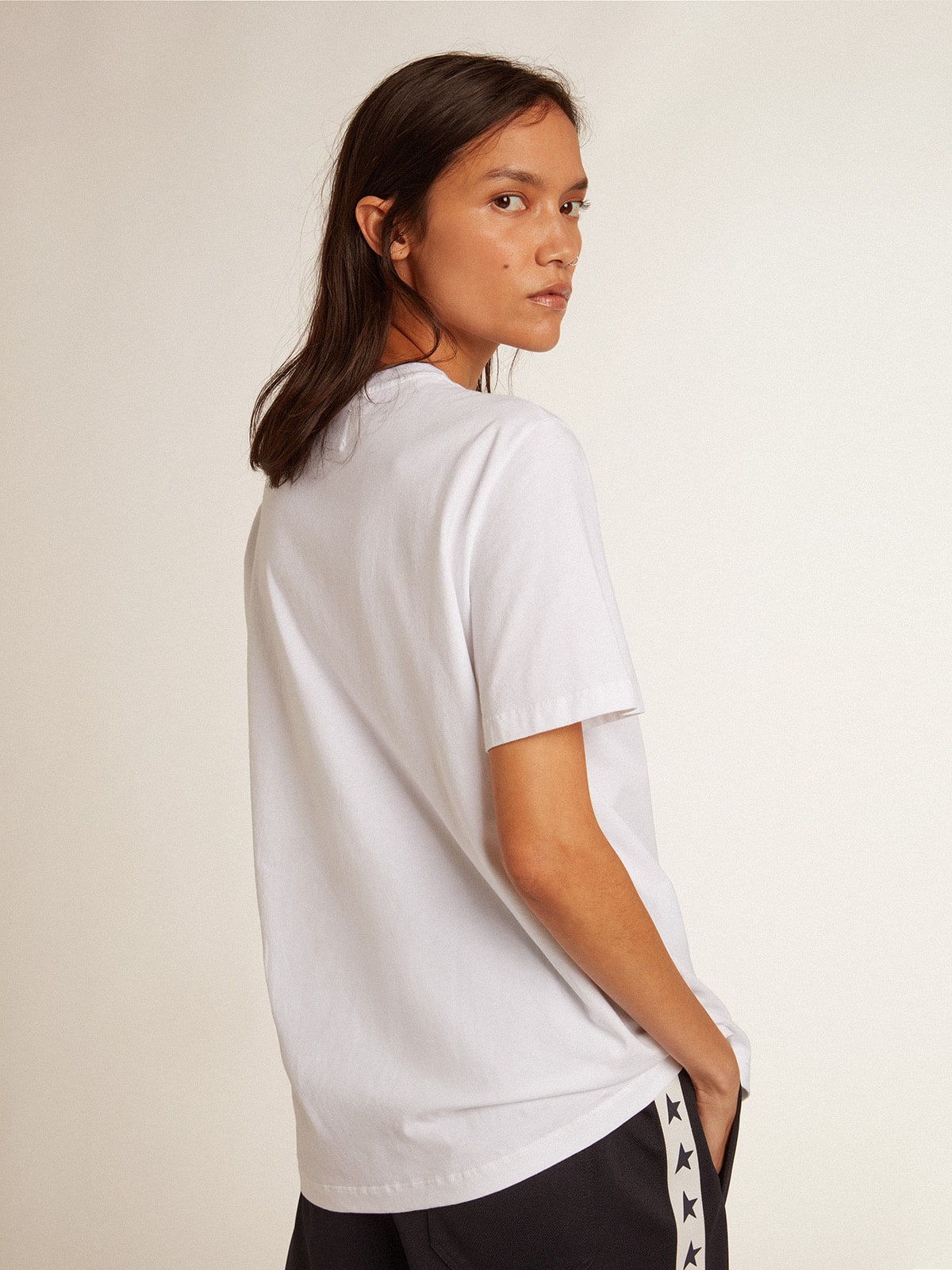 Women's white T-shirt with dark blue star on the front