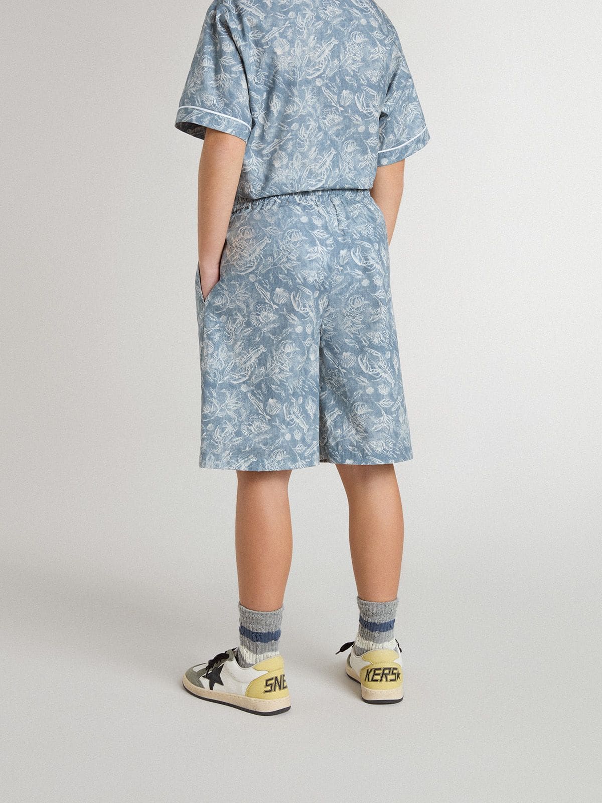 Boys' blue shorts with white print