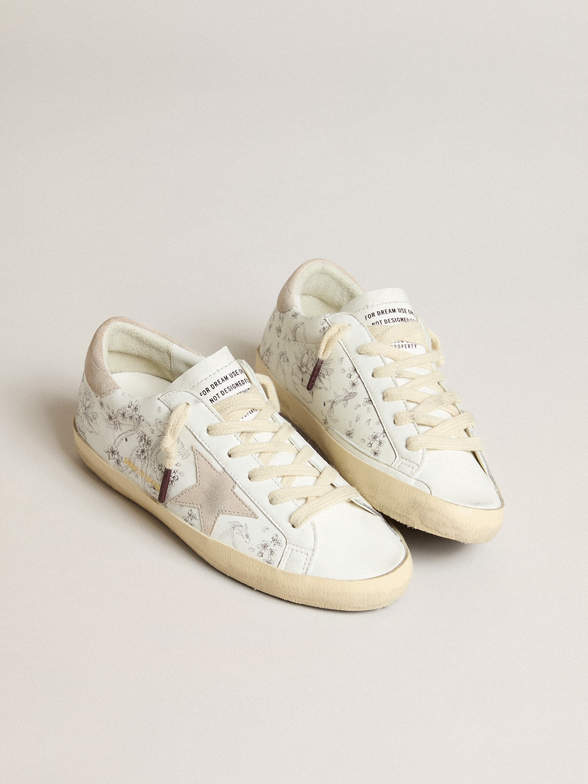 Women's Super-Star LTD CNY in white leather with lettering on the upper