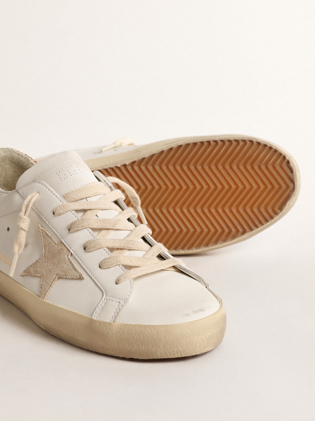 Women's Super-Star with a suede star and peach-pink glitter heel tab