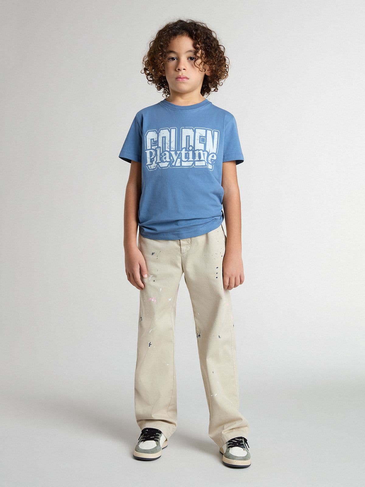 Kids' beige chino pants with multicolor splashes