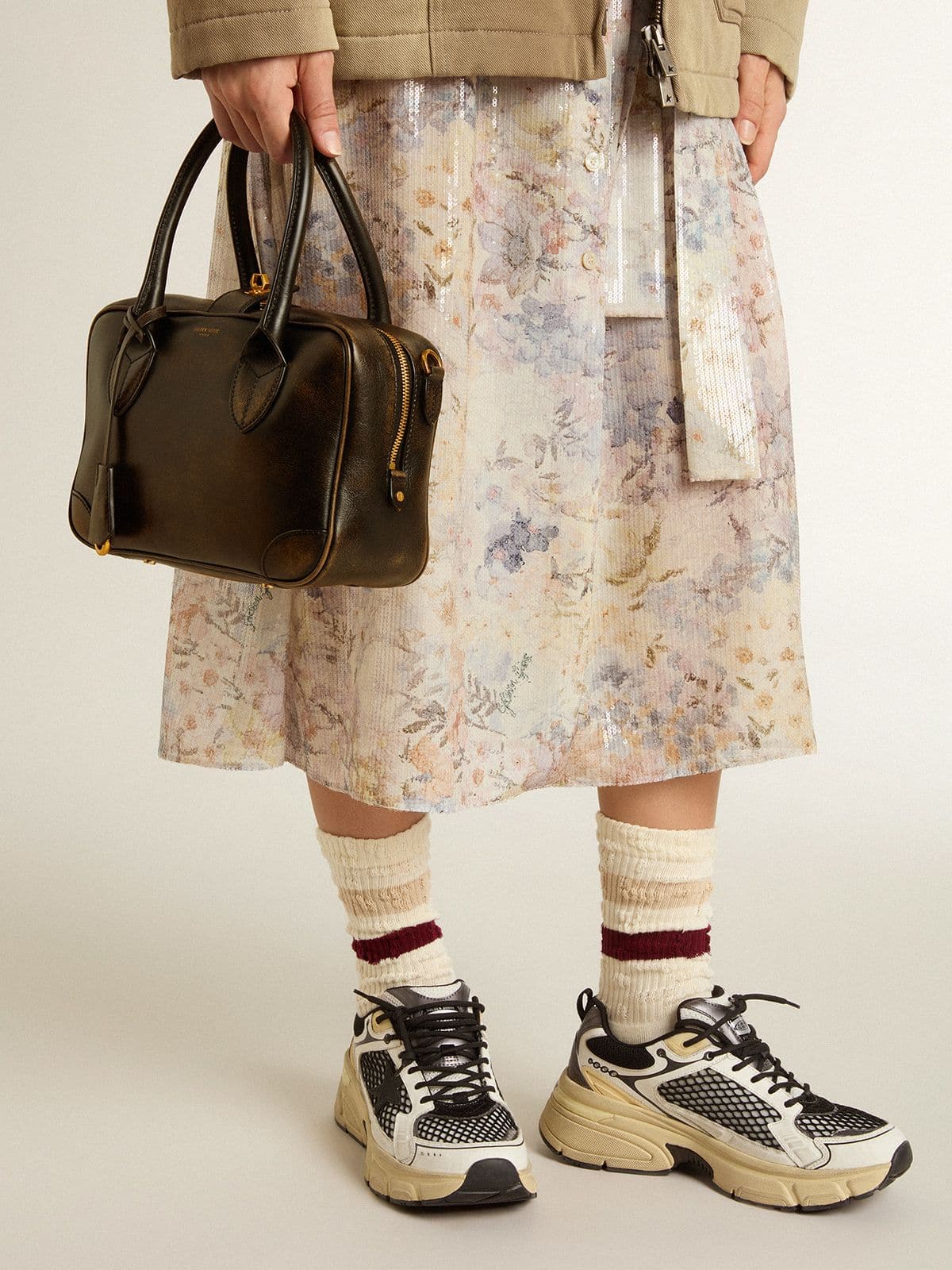 Vita Bag in black distressed leather with gold details