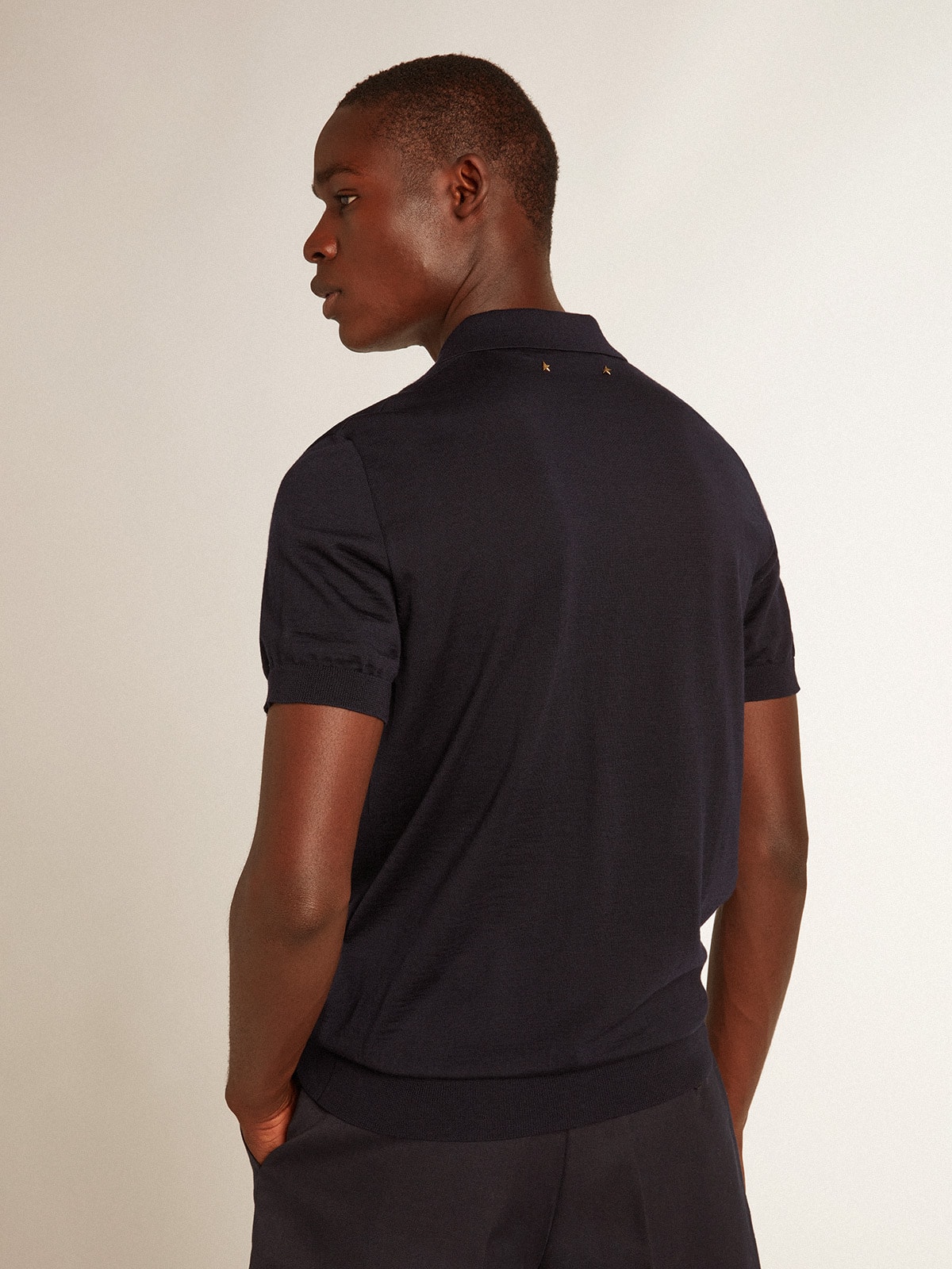Men's short-sleeved polo shirt in navy-blue merino wool