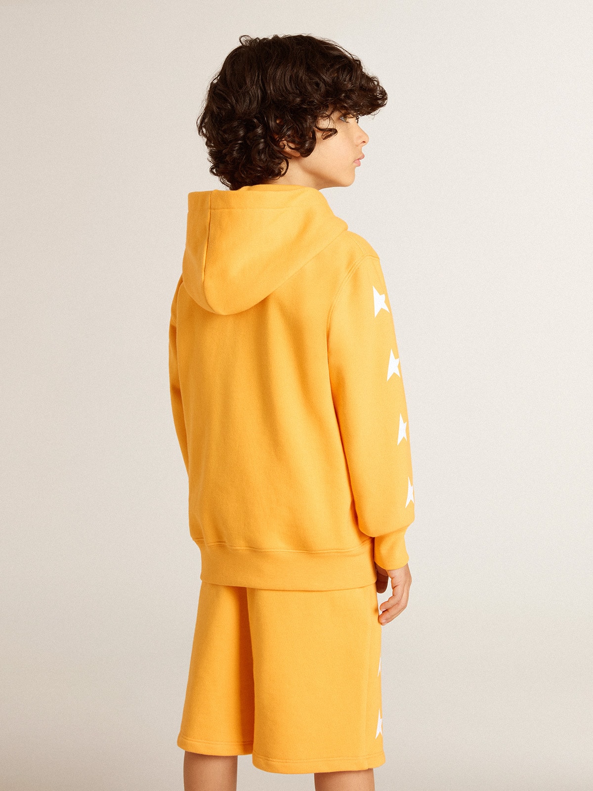Boys' orange sweatshirt with zip fastening