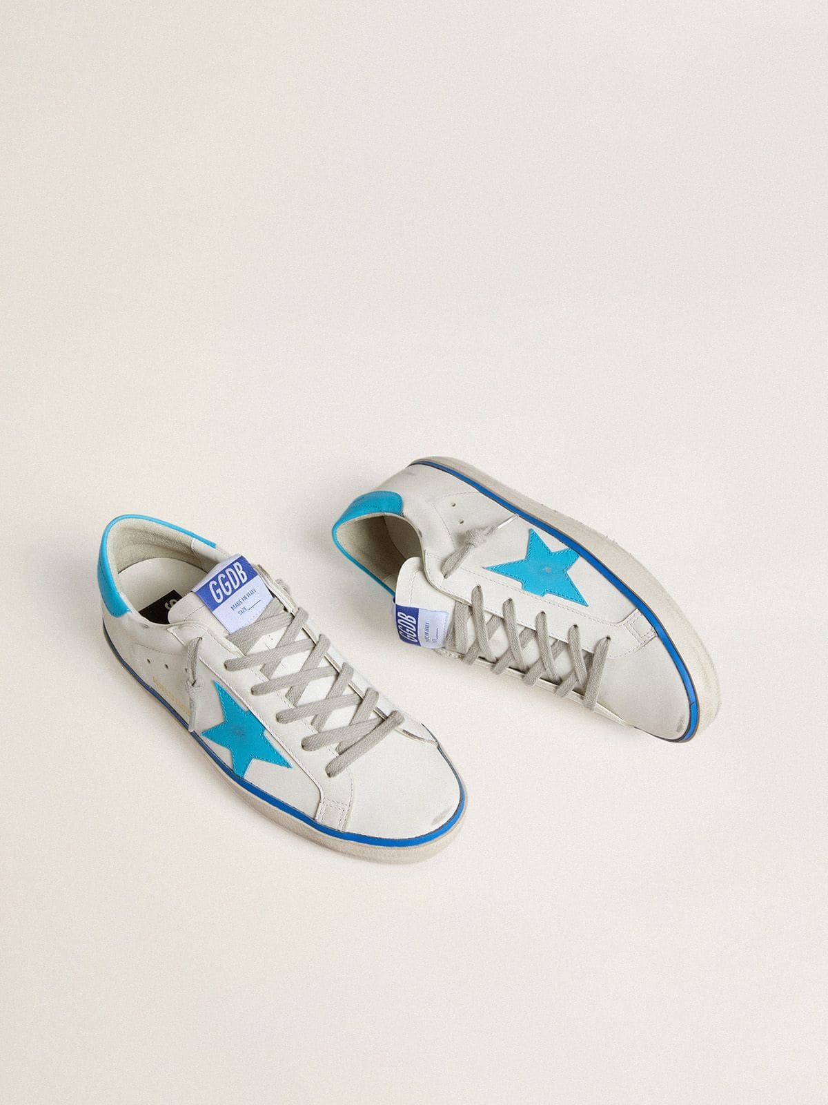 Men's Super-Star LTD in white leather with light blue leather star and heel tab