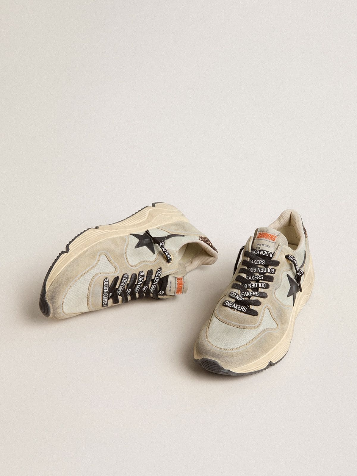 Women's Running Sole in gray nylon with black star and glitter heel tab
