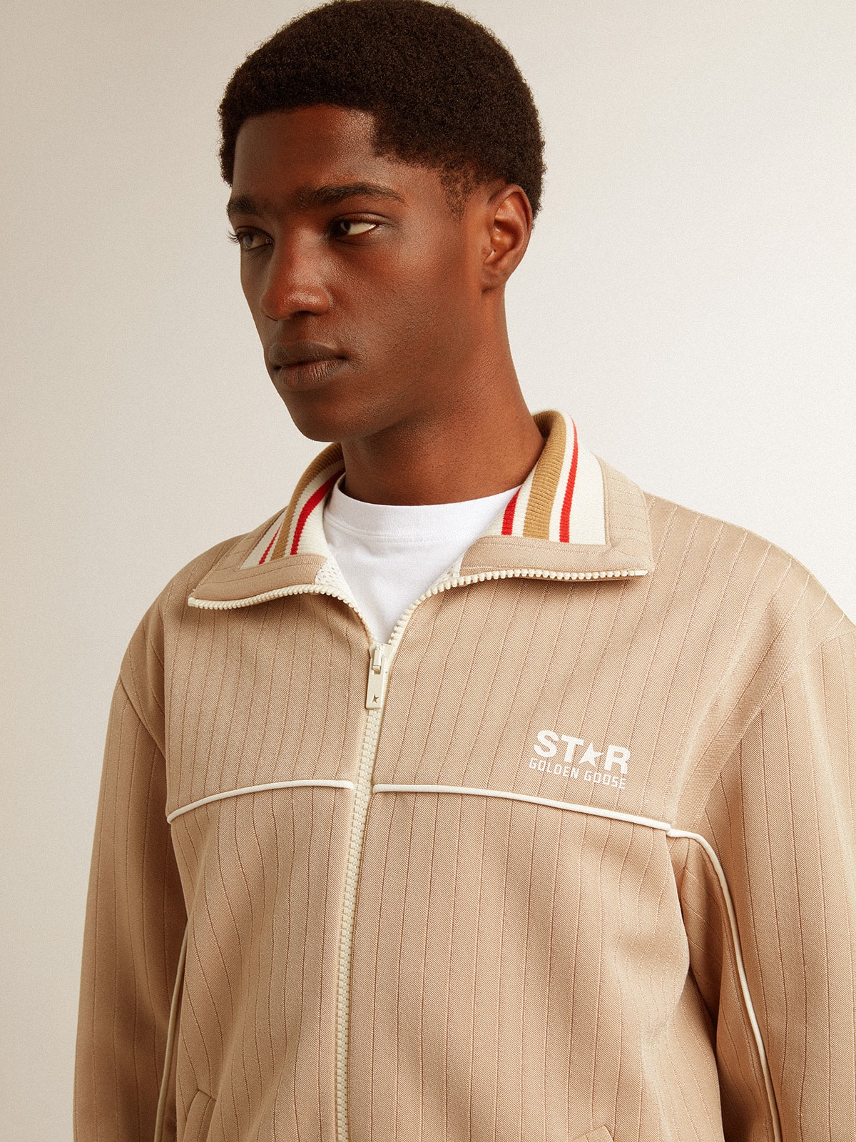 Men's light beige zipped sweatshirt with white logo