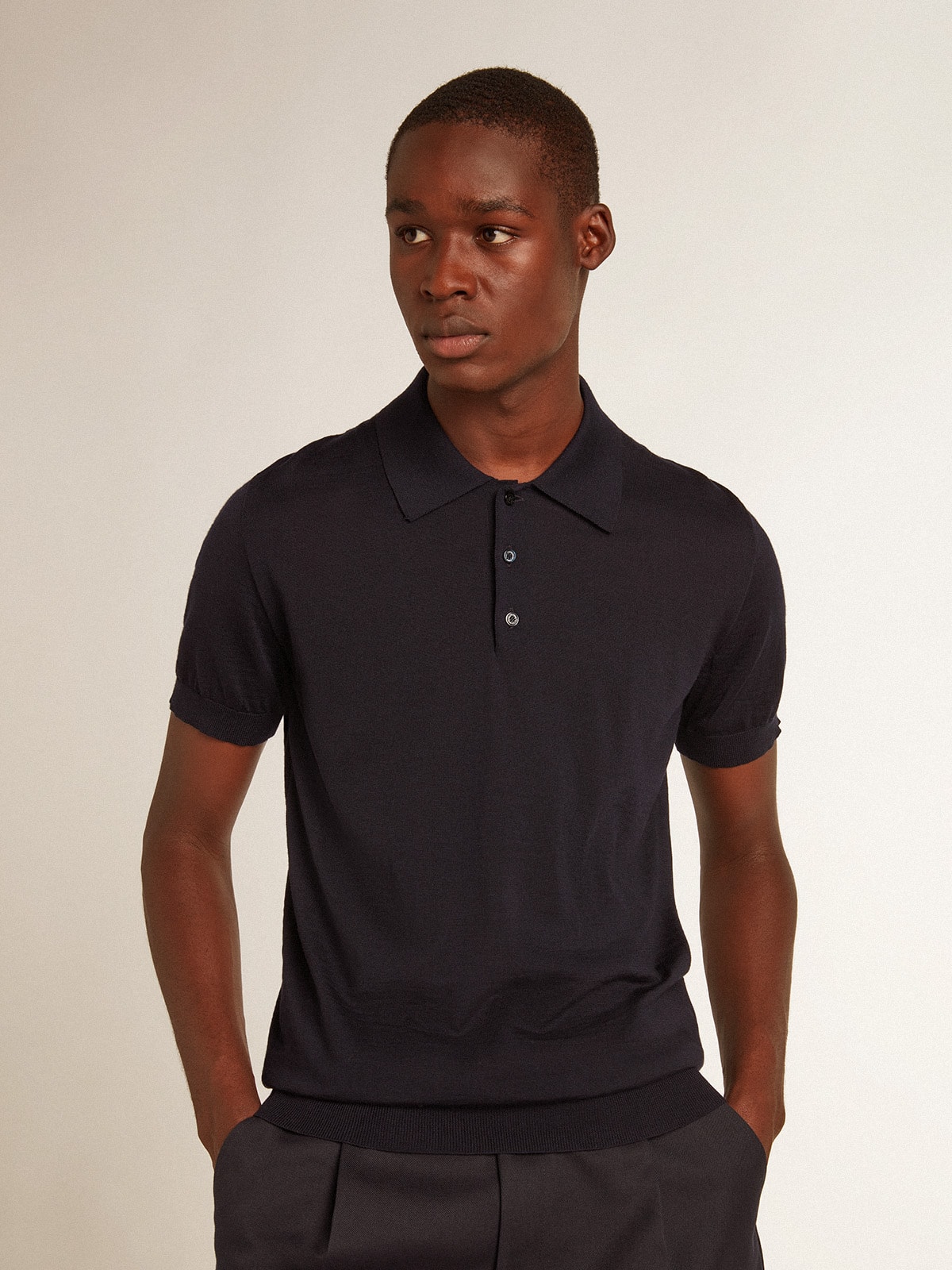 Men's short-sleeved polo shirt in navy-blue merino wool